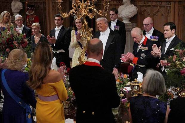 Britain's King Charles, centre, along with Kate, Princess of Wales, toasts with US President Donald Trump at the State Banquet in Windsor Castle, England. (Photo source: AP).