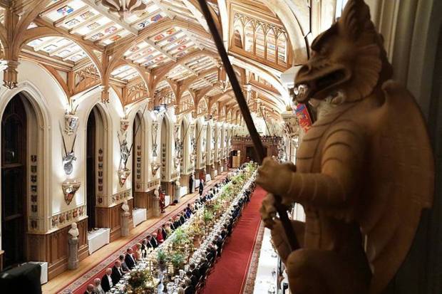 Guests attend a State Banquet during a State visit of President Donald Trump at Windsor Castle in Windsor. (Photo source: AP)