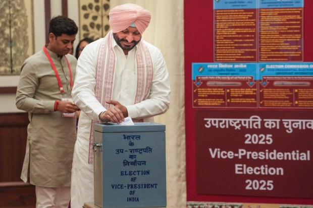 Union Minister of State for Railways and BJP MP Ravneet Singh Bittu casts his vote in the vice presidential elections, at the Parliament premises. (Image: PTI)