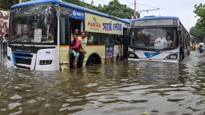 Vehicles, Durga puja pandals submerged, houses flooded as rain cripples Kolkata