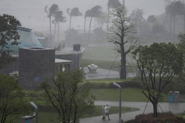 About 5,200 people, around 60% of Guangfu’s population, have taken shelter on the upper floors of homes. (Photo source: AP)