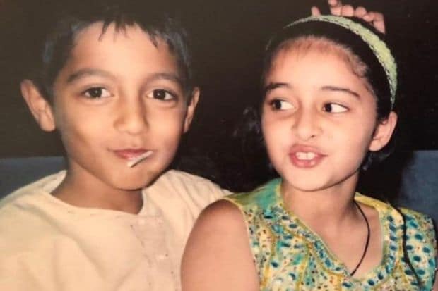 ThrowbackTuesdays should be a thing because who doesn't enjoy looking at childhood pictures of their favourite celebrities on a random Tuesday. In picture: Ahaan and Ananya Panday sharing a sweet moment. (Image source: Pinterest)