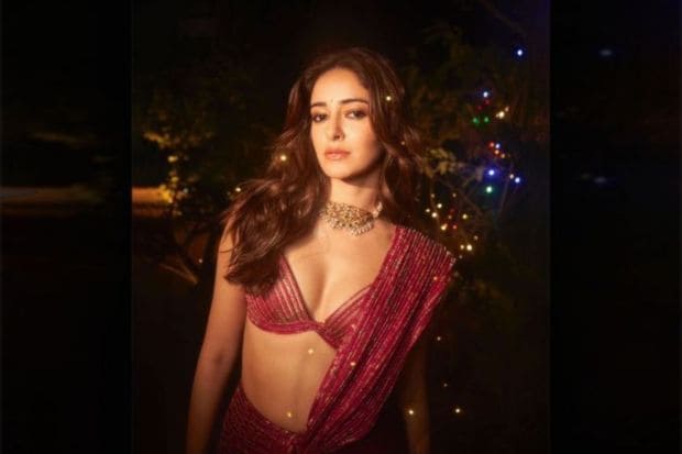 Ananya Panday dazzles in this bold but muted pink lehenga. The outfit with the traditional, gold choker is perfect for an evening get together or party. Chestnut waves and a soft glam makeup look complete the get up. (Image source: Pinterest)