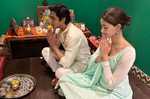 Fast-forward two decades, both cousins have their heads bowed down in prayer. The bond has remained strong throughout, as Ananya and Ahaan demonstrate in this picture. Peep Ananya's pastel blue suit; it is a perfect outfit for a low key celebration or puja. (Image source: Pinterest)