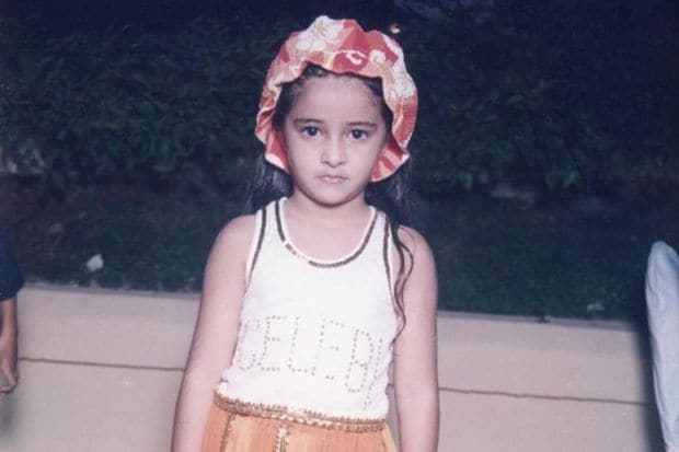 She's always been a little diva. Dressed in her festive best - an Indo-western dress where the top reads 'CELEB!' in a bejewelled font, orange skirt, golden sliders and a bohemian hat - Baby Ananya strikes a pose! (Image source: Pinterest)