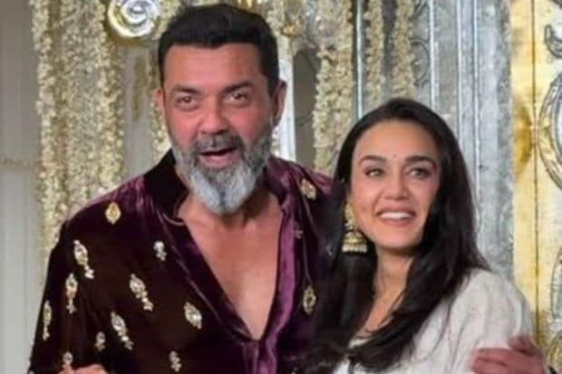 Fans could not get enough of this reunion between Preity Zinta and Bobby Deol. This timeless pair were all smiles and dazzle as they posed for the cameras. (Image: X)