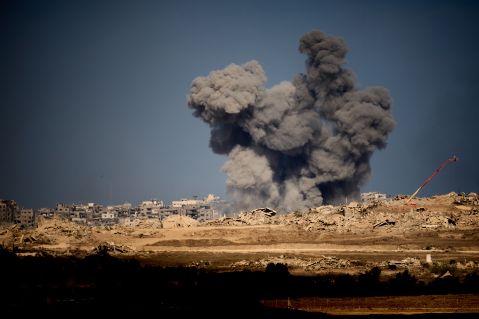 Smoke rises to the sky following an Israeli military strike in the Gaza Strip, as seen from southern Israel, Friday, Oct. 10, 2025, after Israel and Hamas have agreed to a pause in their war and the release of the remaining hostages. (AP Photo/Emilio Morenatti)