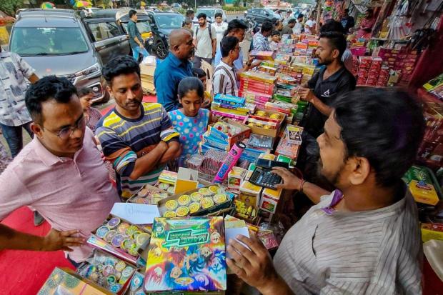 People buy firecrackers ahead of Diwali in Nagpur. (PTI)