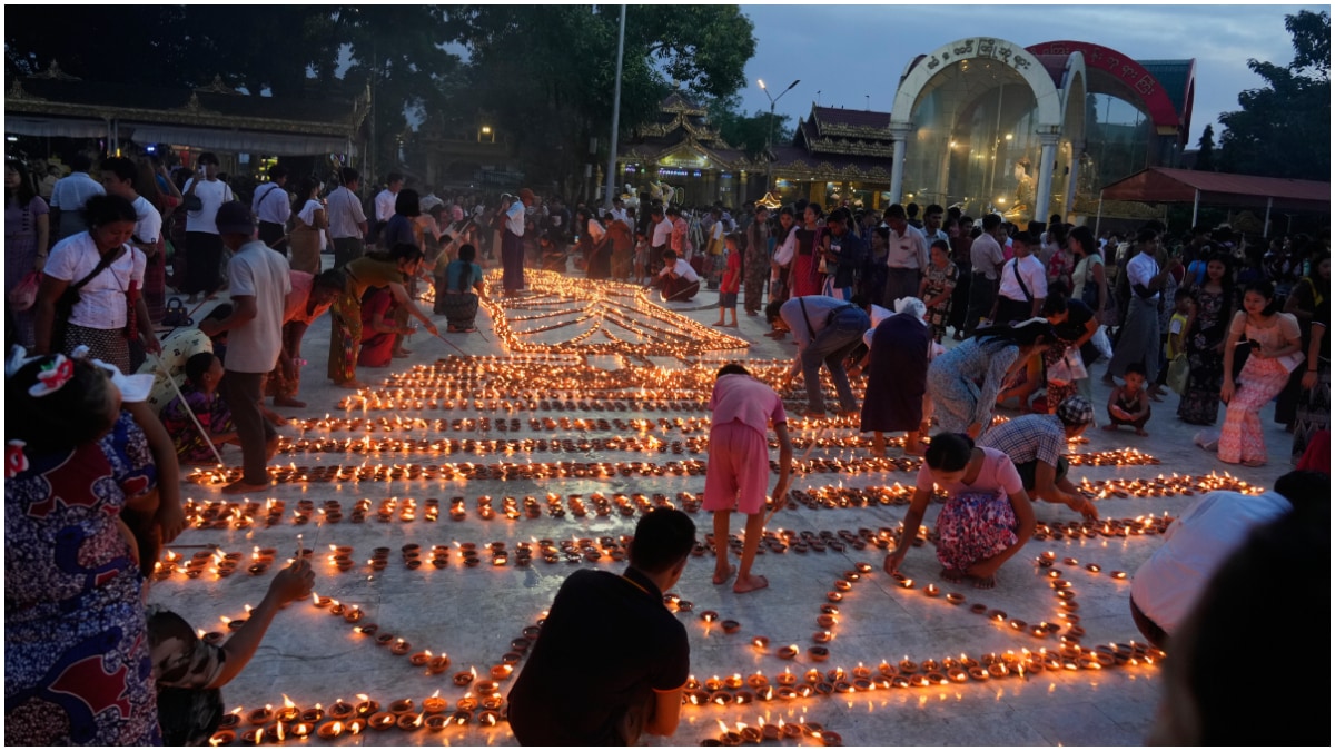 Paraglider drops bombs on Myanmar Buddhist festival