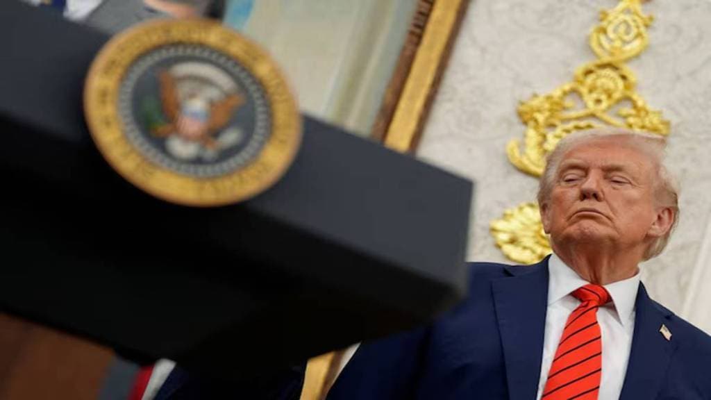 U.S. President Donald Trump listens during an announcement about lowering U.S. drug prices, at the White House in Washington, D.C., U.S., October 10, 2025. (Photo source: Reuters)