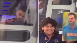 Virat Kohli signs a fan's poster
