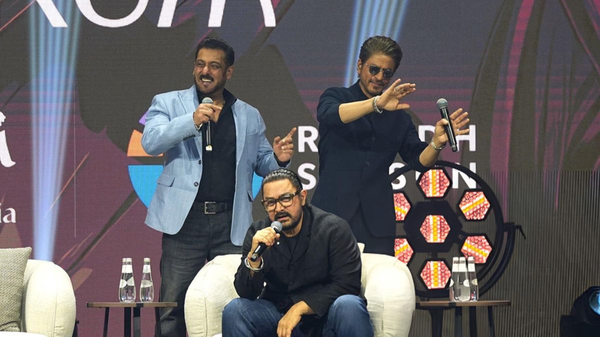 Aamir, Salman and Shah Rukh Khan share a light-hearted moment amid panel discussions at the Joy Forum 2025. (Image source: Iyan Amjad/X) Aamir, Salman and Shah Rukh Khan share a light-hearted moment amid panel discussions at the Joy Forum 2025. (Image source: Iyan Amjad/X)