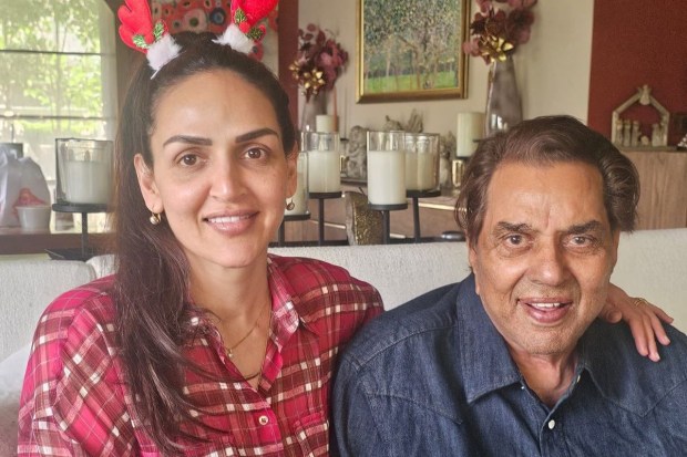 A sweet snap of Dharmendra with his eldest daughter by Hema Malini - Esha Deol. It seems to be a candid shot from Christmas, as Esha dons a festive reindeer headband. (Image source: Hema Malini/X)