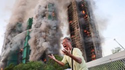 At least four dead as massive fire engulfs Hong Kong residential high-rises