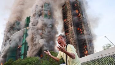 At least 13 dead as massive fire engulfs Hong Kong residential high-rises