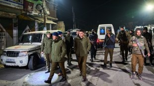 Indian police officers patrol near the site of the explosion in Srinagar (AP Photo)