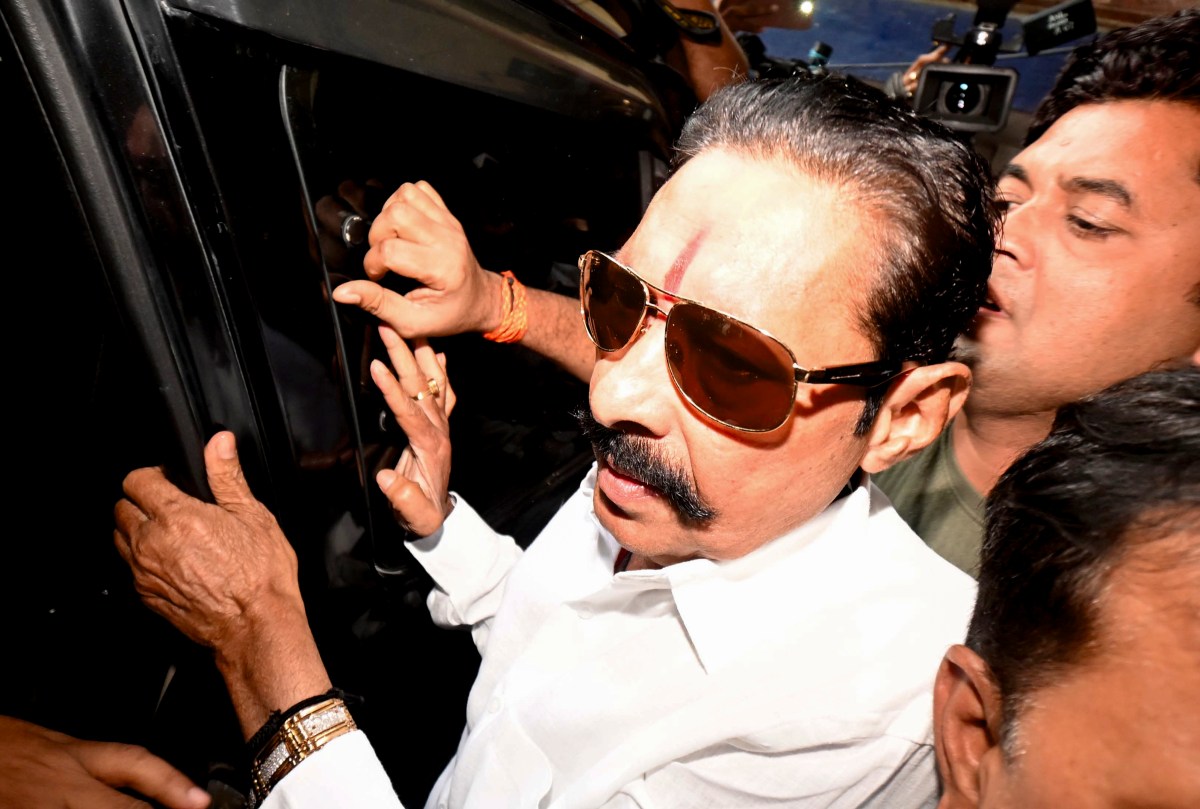 Former Bihar MLA Anant Singh, the JD(U) candidate from the Mokama seat, arrives to be presented before the court after being arrested in connection with the murder of Jan Suraaj supporter Dular Chand Yadav, in Patna, Sunday, Nov. 2, 2025. (PTI Photo) Former Bihar MLA Anant Singh, the JD(U) candidate from the Mokama seat, arrives to be presented before the court after being arrested in connection with the murder of Jan Suraaj supporter Dular Chand Yadav, in Patna, Sunday, Nov. 2, 2025. (PTI Photo)