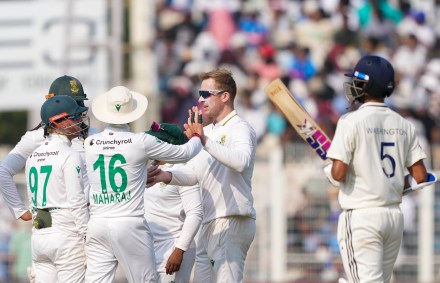 Kolkata: South Africa's Simon Harmer with teammates after the wicket of India's Ravindra Jadeja during the third day of the first Test cricket match of a series between India and South Africa, at Eden Gardens in Kolkata, Sunday, Nov. 16, 2025. (PTI Photo/Swapan Mahapatra)(PTI11_16_2025_000158B)