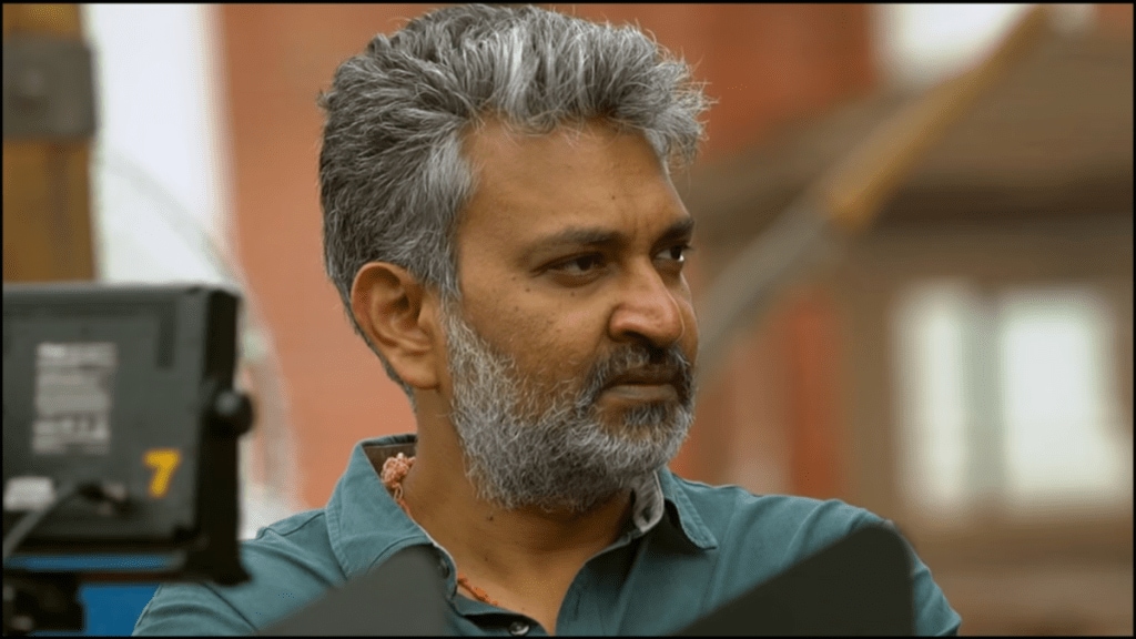 Rajamouli controversy: Filmmaker faces police complaint for Hanuman remark at Varanasi launch. Rajamouli controversy: Filmmaker faces police complaint for Hanuman remark at Varanasi launch.