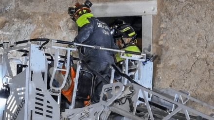 Italy tower collapse: Three workers were rescued unharmed after the initial midday incident, said firefighter spokesperson Luca Cari. Another worker, age 64, was hospitalised in critical condition. Italy tower collapse: Three workers were rescued unharmed after the initial midday incident, said firefighter spokesperson Luca Cari. Another worker, age 64, was hospitalised in critical condition.