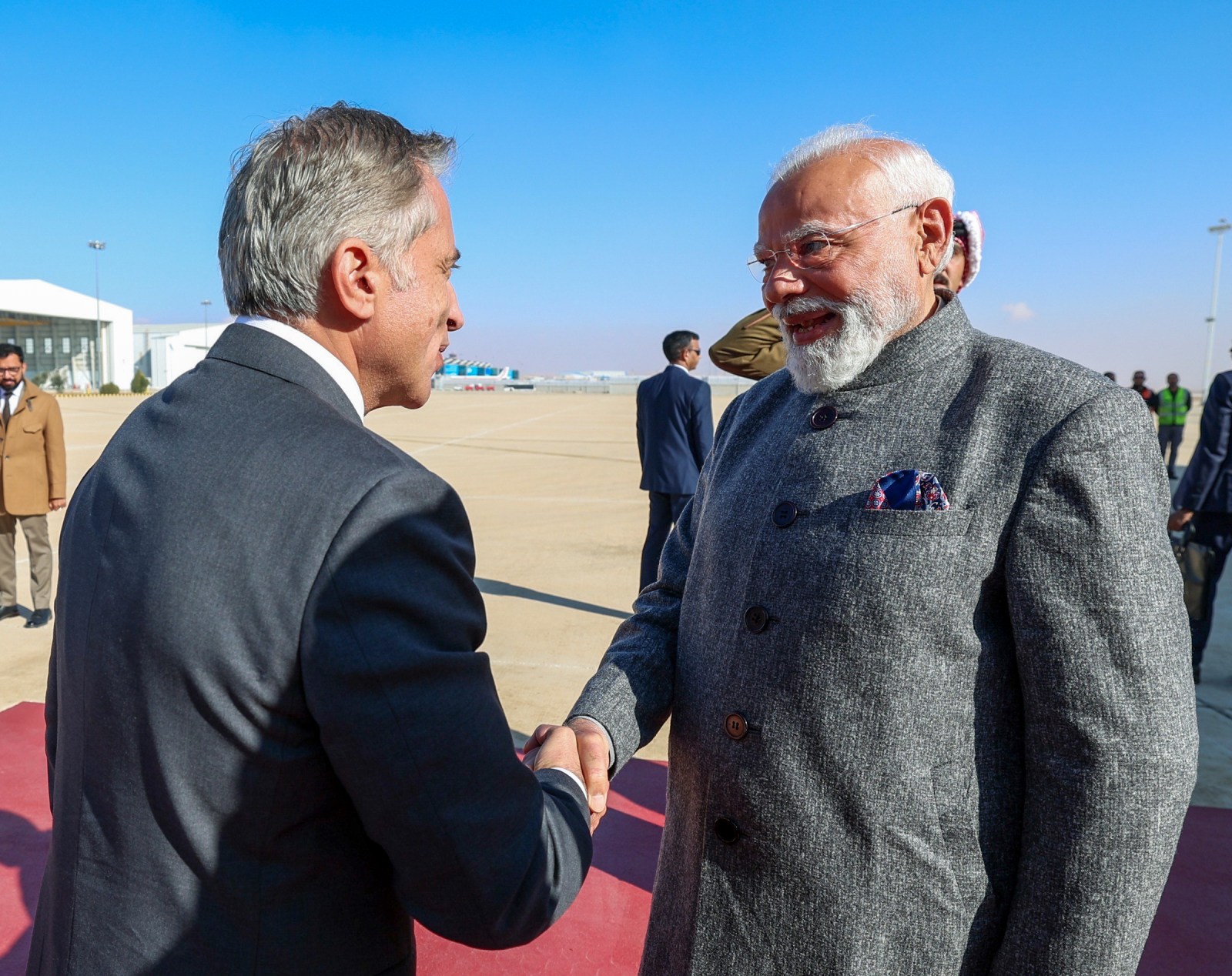 Amman [Jordan], Dec 15 (ANI): Prime Minister Narendra Modi receives a warm welcome from Jordan's Prime Minister, Jafar Hassan, on his arrival, in Amman on Monday. (DPR PMO/ANI Photo)