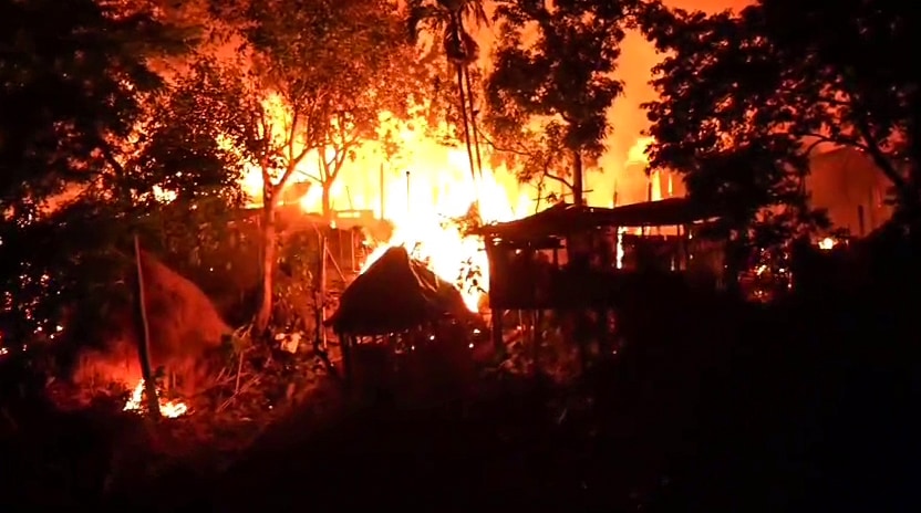 Flames billow out from an area following violent protests in Karbi Anglong on Tuesday. (ANI Video Grab)