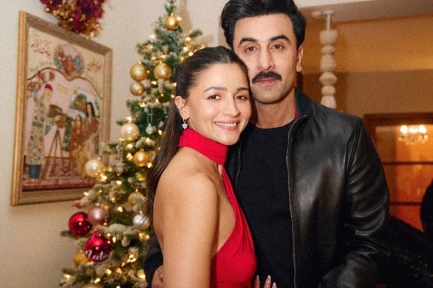 Ranbir Kapoor rarely appears on social media, and when he does, fans make sure to hype him up. Bhatt shared a cute picture as she posed against their Christmas tree. (Image: Instagram)