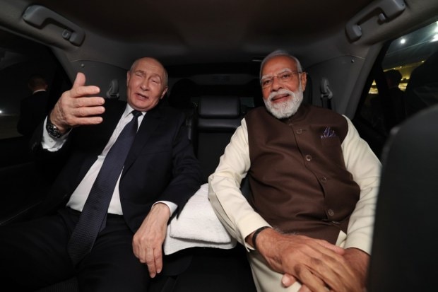 Putin, accompanied by senior Russian ministers and a large business delegation, was escorted by Modi on the red carpet. The two leaders embraced before heading to Modi’s official car. (Image Source: @Narendramodi)