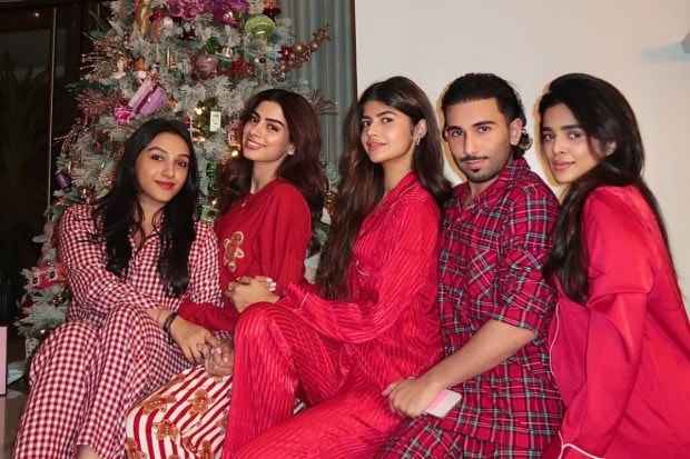 No Bollywood party is complete without Orry. Khushi Kapoor's close socialite friend Orry joined the girl gang in plaid pyjamas for a Christmas sundowner as the Kapoor sisters adorned their silver tree. (Image: Instagram)