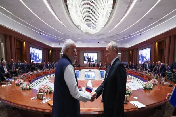President Putin and PM Modi attended the Plenary Session of the India-Russia Trade Forum. (Image Source: @Narendramodi)