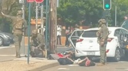 Heavily armed police arrest men on way to Bondi 4 days after terror attack