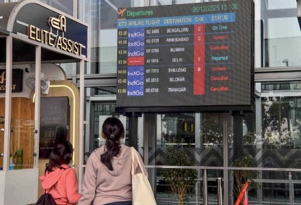 Passengers check updates on the display board amid IndiGo flight disruptions, at Netaji Subhash Chandra Bose International Airport in Kolkata, Saturday, Dec. 6, 2025. (PTI Photo) Passengers check updates on the display board amid IndiGo flight disruptions, at Netaji Subhash Chandra Bose International Airport in Kolkata, Saturday, Dec. 6, 2025. (PTI Photo)