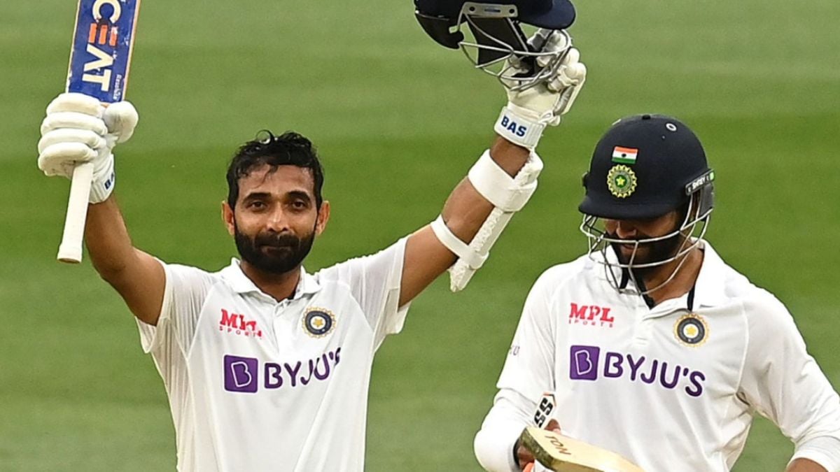 Ajinkya Rahane raised his bat after scoring a hundred in the Boxing Day Test against Australia in 2020. But there was no big celebration. Just a quiet nod. Like he knew this was his job. (Photo Source: AP/PTI)