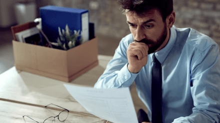 Reddit user shares emotional account of being laid off after one month at a dream job, highlighting the sudden impact on work-life balance and personal plans.