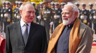 Russian President Vladimir Putin and PM Narendra Modi at the India-Russia Business Forum, discussing Make in India initiatives, nuclear energy projects, and pharmaceutical collaborations.