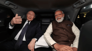 Russian President Vladimir Putin is warmly greeted by Prime Minister Narendra Modi at New Delhi airport on Thursday, ahead of two-day summit talks focusing on India-Russia strategic and economic cooperation.