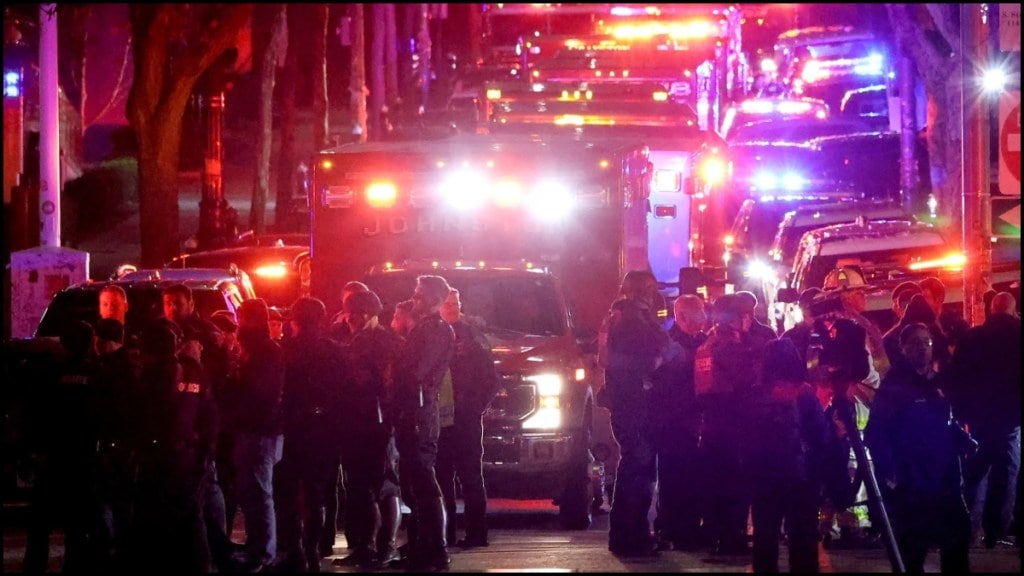 Emergency personnel gather on Waterman Street at Brown University in Providence, R.I., on Saturday, Dec. 13, 2025, during the investigation of a shooting. (AP Photo/Mark Stockwell) Emergency personnel gather on Waterman Street at Brown University in Providence, R.I., on Saturday, Dec. 13, 2025, during the investigation of a shooting. (AP Photo/Mark Stockwell)