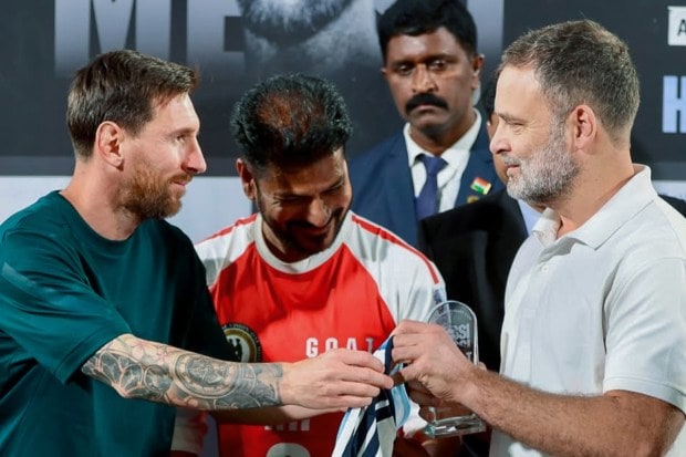 Argentine football icon Lionel Messi presents his iconic number 10 jersey to Lok Sabha Leader of Opposition Rahul Gandhi during an event held as part of the GOAT India Tour 2025 at the Rajiv Gandhi International Stadium in Hyderabad. (Image: @IYC X/ANI)