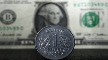 Rupee hits new record low at 90.42; pares losses on RBI support