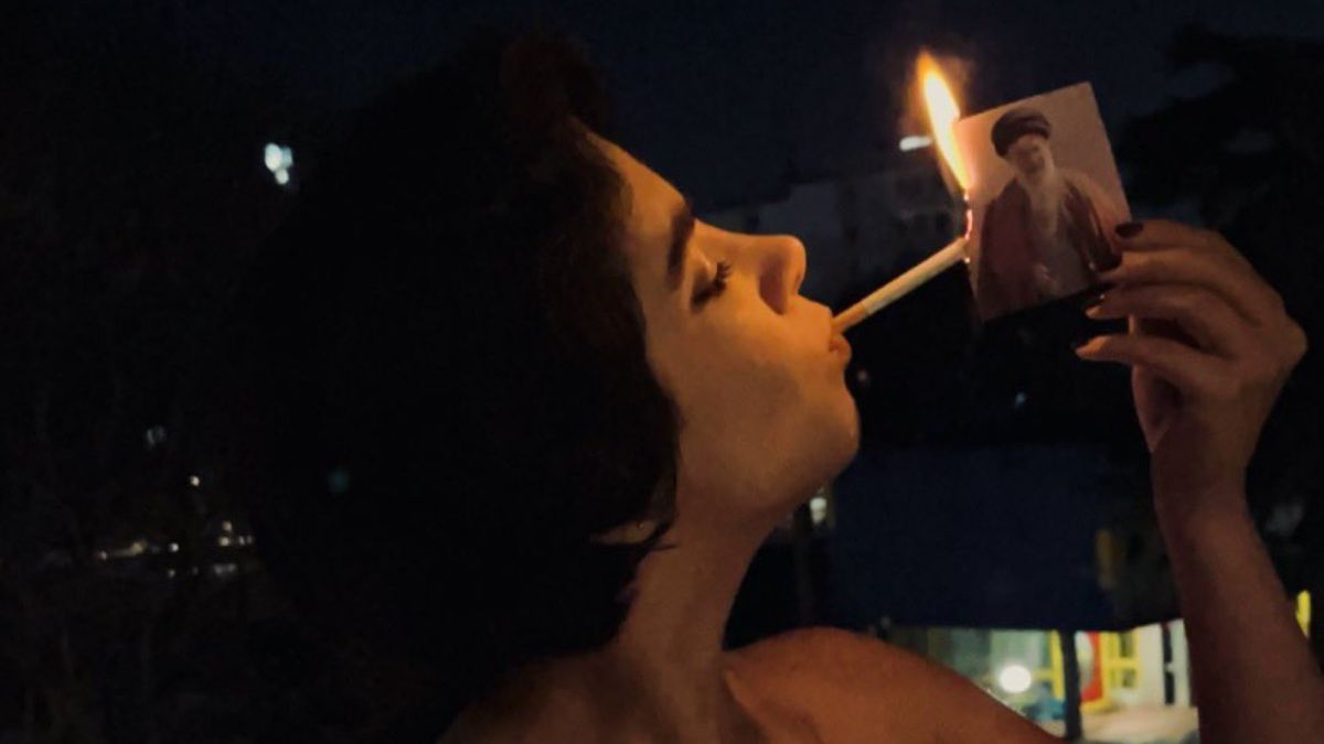 Burning the supreme leader’s image is a serious offence under Iranian law, and smoking for women, still socially discouraged despite modernising trends adds another layer of taboo to the act. Burning the supreme leader’s image is a serious offence under Iranian law, and smoking for women, still socially discouraged despite modernising trends adds another layer of taboo to the act.
