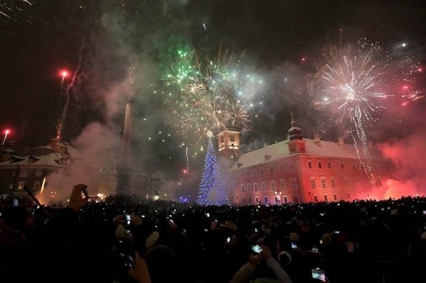 Fireworks fan out above the Royal Castle shortly after midnight, lighting up the historic heart of Warsaw, Poland, for the first moments of 2026. (Photo source: AP)