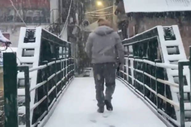 7.     Bhaderwah Valley turns white as residents wake up to the first snowfall of the season. (Photo source: ANI)