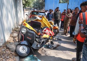 A view of a damaged rickshaw after a portion of a cement metro pillar collapsed during the construction work and fell onto it at LBS Road in Mulund (ANI Photo)