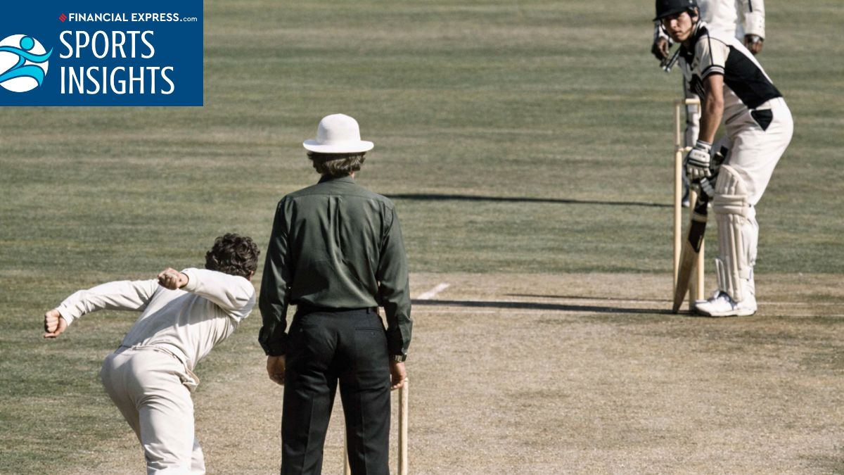 Wide shot of the Melbourne Cricket Ground in 1981 showing the Australia vs New Zealand underarm bowling delivery moment with players in silhouettes