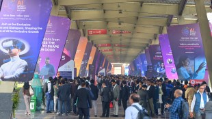 Delegates and workers stand in a queue to get in for the AI-Summit in New Delhi (Photo: AP)