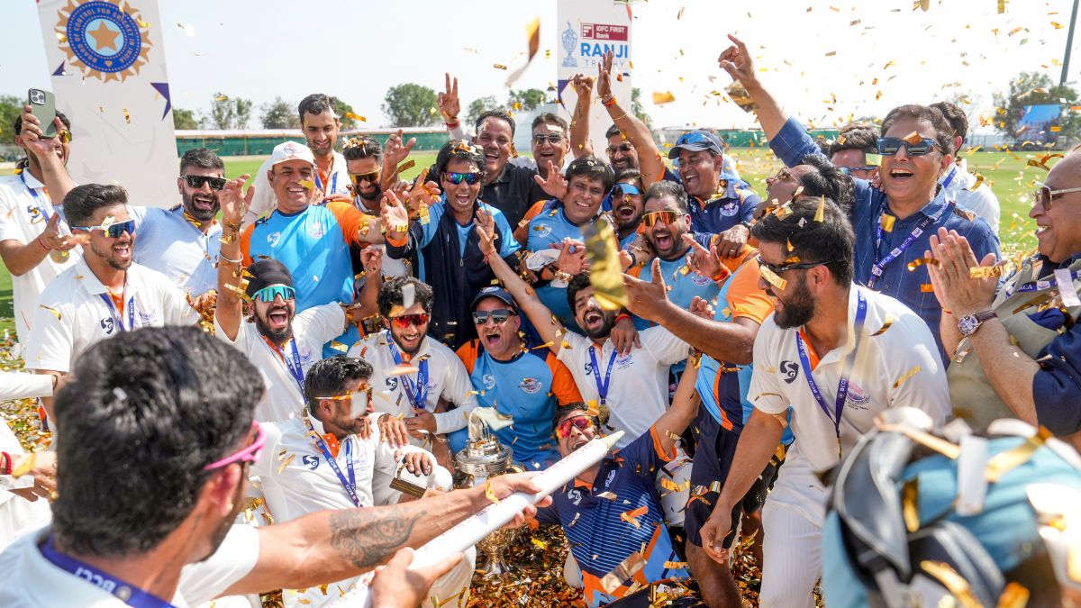 Jammu and Kashmir players celebrate their maiden and historic Ranji Trophy title win against Karnataka. Jammu and Kashmir players celebrate their maiden and historic Ranji Trophy title win against Karnataka.