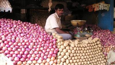 Potato, onion prices slide on record supplies 