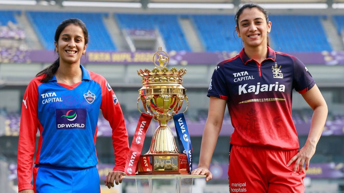 Smriti Mandhana and Jemimah Rodrigues standing with the WPL 2026 trophy at the Vadodara International Cricket Stadium