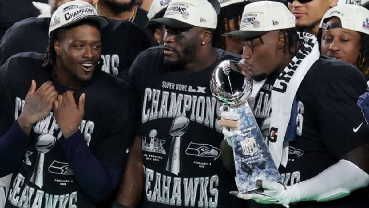 NFL - Super Bowl LX - New England Patriots v Seattle Seahawks - Levi's Stadium, Santa Clara, California, United States - February 8, 2026 Seattle Seahawks players celebrate with the trophy on the podium after winning the Super Bowl LX. (Photo Source: Reuters)