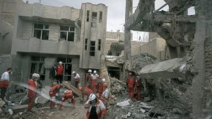 First responders inspect the remains of a residential building struck during the US-Israeli military campaign in Iran's Tabriz (Photo: AP)